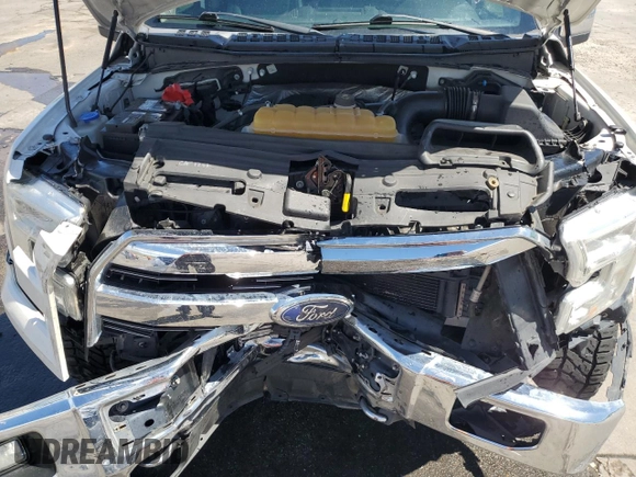 2015 Ford F-150 XLT with VIN 1FTEW1EG4FKD27840, listed as a Copart auction lot 57405215 with 134,036 mi miles and Salvage title. Bid and sale history available at DreamBid. Image 11.