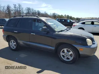 2004 Hyundai Santa Fe GLS with VIN KM8SC13E54U700457, listed as a Copart auction lot 53755855 with 101,565 mi miles and Clean Title. Bid and sale history available at DreamBid. Image 4.