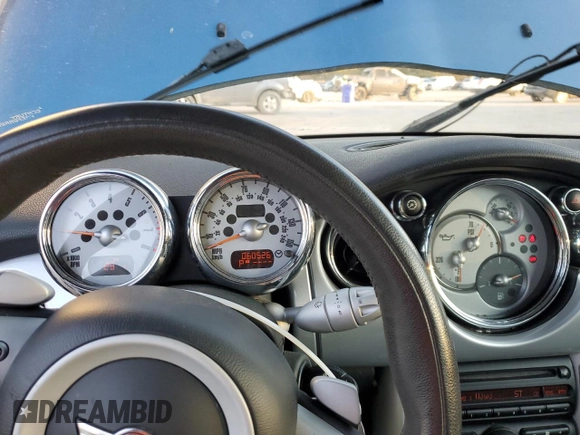 2006 MINI Convertible S with VIN WMWRH33526TL93206, listed as a Copart auction lot 46114075 with 60,526 mi miles and Salvage title. Bid and sale history available at DreamBid. Image 9.