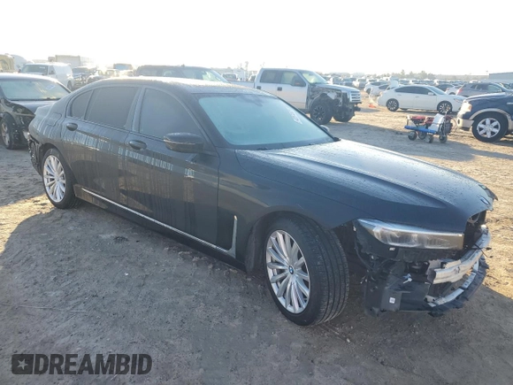 2020 BMW 7 Series 740i with VIN WBA7T2C0XLCE02429, listed as a Copart auction lot 42574835 with 73,970 mi miles and Salvage Title. Bid and sale history available at carsss.com. Image 4.