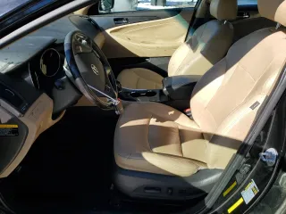 2012 Hyundai Sonata Hybrid with VIN KMHEC4A44CA057592, listed as a Copart auction lot 85784944 with 110,520 mi miles and Salvage Title. Bid and sale history available at DreamBid. Image 7.