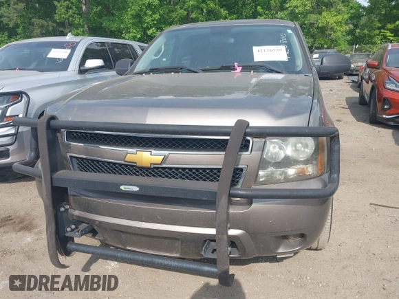 2012 Chevrolet Tahoe Commercial with VIN 1GNLC2E07CR187432, listed as a IAAI auction lot 42126539 with 169,607 mi miles and . Bid and sale history available at DreamBid. Image 6.