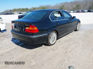 2002 BMW 3 Series 330i with VIN WBAEV53442KM20285, listed as a IAAI auction lot 41513330 with 239,374 mi miles and . Bid and sale history available at DreamBid. Image 4.