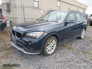 2015 BMW X1 xDrive28i with VIN WBAVL1C56FVY27567, listed as a IAAI auction lot 42047505 with 160,013 mi miles. Bid and sale history available at carsss.com. Image 2.