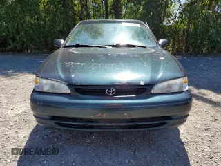 1999 Toyota Corolla VE with VIN 1NXBR12E7XZ240321, listed as a Copart auction lot 64259115 with 144,145 mi miles and Salvage title. Bid and sale history available at DreamBid. Image 5.