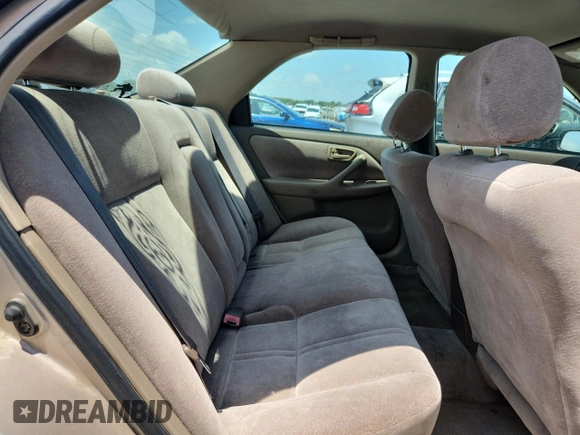 1999 Toyota Camry LE с VIN 4T1BG22KXXU874840, выставлен на аукционе Copart как лот 61271895 с пробегом 288 482 миль миль и Чистый • Clean title. История ставок и продаж доступна на DreamBid. Изображение 10.