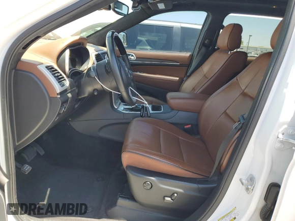 2018 Jeep Grand Cherokee Summit with VIN 1C4RJEJG9JC212554, listed as a Copart auction lot 63123065 with 82,976 mi miles and Salvage title. Bid and sale history available at DreamBid. Image 7.