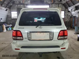 2006 Lexus LX 470 with VIN JTJHT00W464015842, listed as a Copart auction lot 66004384 with 104,402 mi miles and Salvage Title. Bid and sale history available at carsss.com. Image 6.