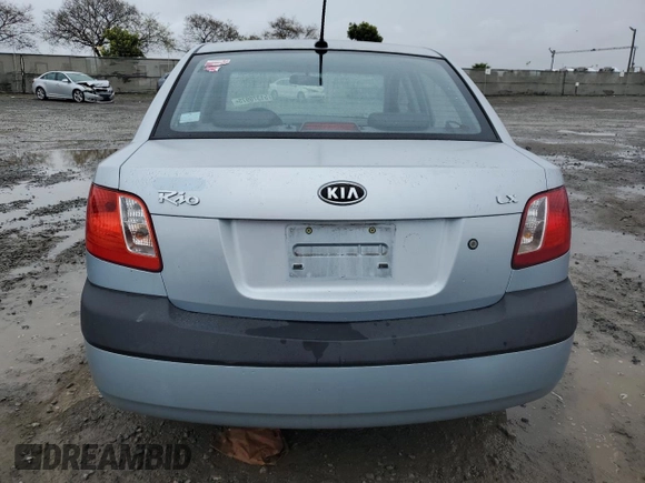 2009 Kia Rio LX with VIN KNADE223396443465, listed as a Copart auction lot 51370975 with 110,952 mi miles and Salvage Title. Bid and sale history available at carsss.com. Image 6.