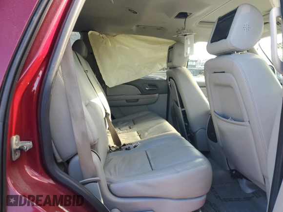 2009 GMC Yukon SLT w/4SA with VIN 1GKFK330X9R207168, listed as a Copart auction lot 85997244 with 123,227 mi miles and Salvage Title. Bid and sale history available at carsss.com. Image 11.