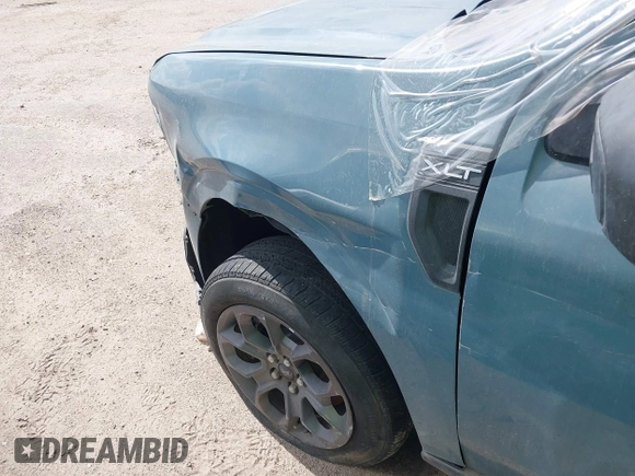 2022 Ford Maverick XL z VIN 3FTTW8E91NRA83544, wystawiony jako IAAI lot #41516295 z przebiegiem Nie podano mil oraz . Historia ofert i sprzedaży dostępna na DreamBid. Obrazek 6.