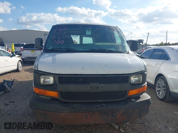 2013 Chevrolet Express Cargo with VIN 1GCWGFBA6D1185850, listed as a IAAI auction lot 40965967 with 165,641 mi miles and . Bid and sale history available at DreamBid. Image 12.