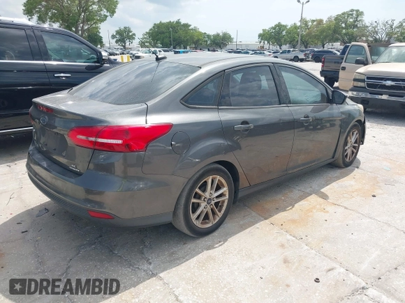 2016 Ford Focus SE with VIN 1FADP3F27GL264452, listed as a IAAI auction lot 41842240 with 180,261 mi miles. Bid and sale history available at carsss.com. Image 4.