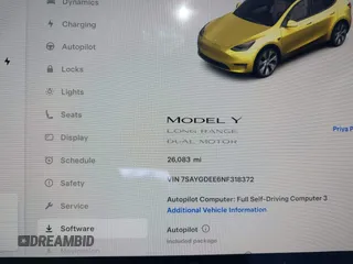 2022 Tesla Model Y Long Range with VIN 7SAYGDEE6NF318372, listed as a IAAI auction lot 41526857 with 26,083 mi miles and . Bid and sale history available at carsss.com. Image 7.