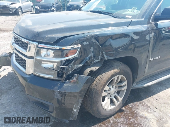 2016 Chevrolet Tahoe LS z VIN 1GNSKAKC7GR409402, wystawiony jako IAAI lot #42594767 z przebiegiem 210 315 mil mil oraz . Historia ofert i sprzedaży dostępna na DreamBid. Obrazek 6.