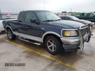 2000 Ford F-150 XL with VIN 1FTRX17L0YKA68579, listed as a IAAI auction lot 41941226 with 1 mi miles. Bid and sale history available at carsss.com. Image 1.