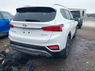 2019 Hyundai Santa Fe Limited z VIN 5NMS5CAA4KH040376, wystawiony jako IAAI lot #42192813 z przebiegiem 33 464 mil mil oraz . Historia ofert i sprzedaży dostępna na DreamBid. Obrazek 4.