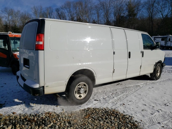 2019 Chevrolet Express Cargo Van with VIN 1GCWGBFP2K1182089, listed as a Copart auction lot 83420944 with 148,415 mi miles and Salvage Title. Bid and sale history available at carsss.com. Image 3.