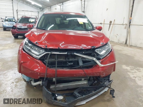 2017 Honda CR-V Touring with VIN 2HKRW2H95HH610401, listed as a IAAI auction lot 42177024 with 42,494 mi miles and . Bid and sale history available at carsss.com. Image 12.