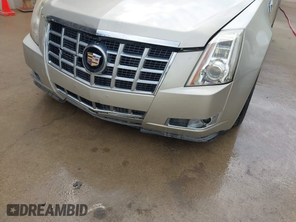 2013 Cadillac CTS Coupe Premium with VIN 1G6DS1E36D0107566, listed as a IAAI auction lot 42079197 with 122,386 mi miles. Bid and sale history available at carsss.com. Image 6.