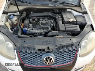 2009 Volkswagen GTI z VIN WVWHV71K89W101309, wystawiony jako Copart lot #70181114 z przebiegiem 121 728 mil mil oraz Szkoda całkowita • Salvage title. Historia ofert i sprzedaży dostępna na DreamBid. Obrazek 12.
