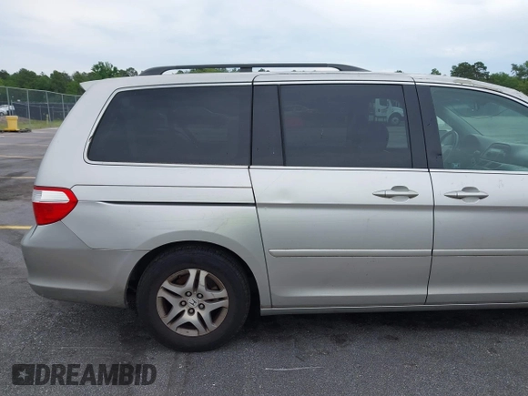 2007 Honda Odyssey EX-L z VIN 5FNRL38647B426620, wystawiony jako IAAI lot #42059093 z przebiegiem 258 622 mil mil oraz . Historia ofert i sprzedaży dostępna na DreamBid. Obrazek 14.
