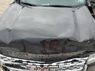 2020 GMC Acadia Denali with VIN 1GKKNPLS6LZ142597, listed as a Copart auction lot 50744275 with 63,053 mi miles and Salvage title. Bid and sale history available at DreamBid. Image 13.