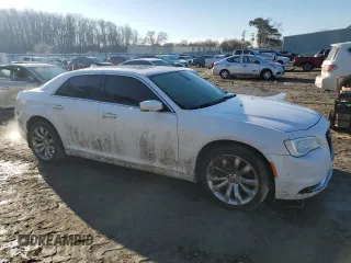 2016 Chrysler 300 Limited with VIN 2C3CCARG5GH230704, listed as a Copart auction lot 45487525 with 97,685 mi miles and Salvage Title. Bid and sale history available at DreamBid. Image 4.