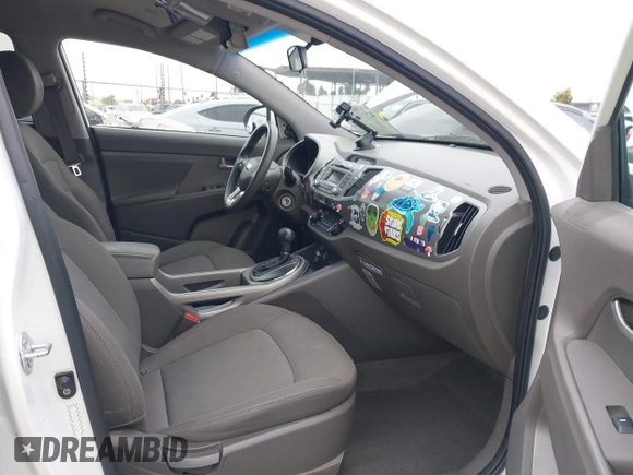 2013 Kia Sportage LX with VIN KNDPBCA21D7356092, listed as a IAAI auction lot 42111086 with 102,521 mi miles and . Bid and sale history available at carsss.com. Image 5.