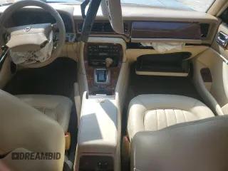 1996 Jaguar XJ z VIN SAJHX1746TC756451, wystawiony jako Copart lot #48991655 z przebiegiem 115 015 mil mil oraz Szkoda całkowita • Salvage title. Historia ofert i sprzedaży dostępna na DreamBid. Obrazek 8.