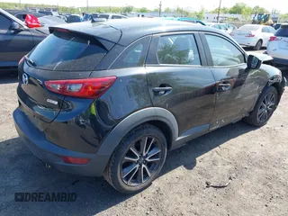 2018 Mazda CX-3 Touring z VIN JM1DKDC70J0329410, wystawiony jako IAAI lot #42137391 z przebiegiem 86 013 mil mil oraz . Historia ofert i sprzedaży dostępna na DreamBid. Obrazek 4.