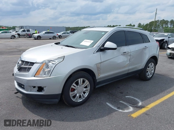 2011 Cadillac SRX Luxury Collection with VIN 3GYFNAEY5BS563048, listed as a IAAI auction lot 42031973 with 182,047 mi miles and . Bid and sale history available at DreamBid. Image 2.