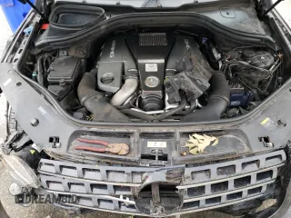 2015 Mercedes-Benz M 63 AMG with VIN 4JGDA7EB0FA440509, listed as a Copart auction lot 73954174 with 74,650 mi miles and Salvage Title. Bid and sale history available at carsss.com. Image 14.