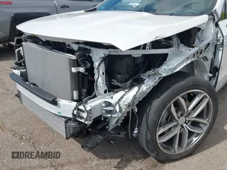 2022 Cadillac XT4 FWD Sport with VIN 1GYFZER44NF164899, listed as a IAAI auction lot 42152554 with 8,058 mi miles and . Bid and sale history available at carsss.com. Image 6.
