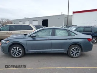 2022 Volkswagen Jetta with VIN 3VWNM7BU7NM028222, listed as a IAAI auction lot 41348223 with 50,623 mi miles and . Bid and sale history available at DreamBid. Image 14.