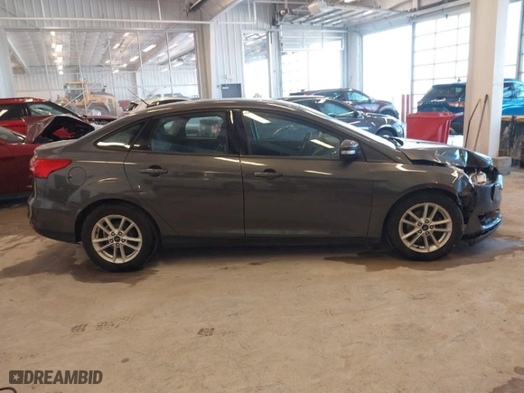 2015 Ford Focus SE with VIN 1FADP3F21FL340262, listed as a IAAI auction lot 41669915 with 134,731 mi miles. Bid and sale history available at carsss.com. Image 13.