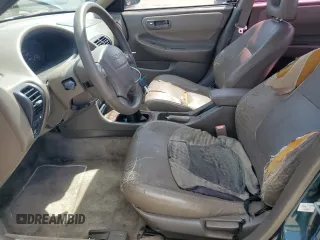 1998 Acura Integra z VIN JH4DB7568WS003841, wystawiony jako Copart lot #53402765 z przebiegiem 165 169 mil mil oraz Szkoda całkowita • Salvage title. Historia ofert i sprzedaży dostępna na DreamBid. Obrazek 7.