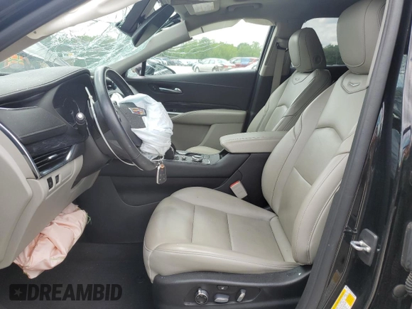 2020 Cadillac XT4 FWD Premium Luxury with VIN 1GYFZCR46LF113499, listed as a Copart auction lot 57534205 with 64,859 mi miles and Salvage title. Bid and sale history available at DreamBid. Image 7.