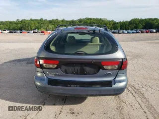2001 Ford Taurus SE Standard with VIN 1FAHP58S71G184725, listed as a Copart auction lot 56401895 with 163,238 mi miles and Salvage title. Bid and sale history available at DreamBid. Image 6.