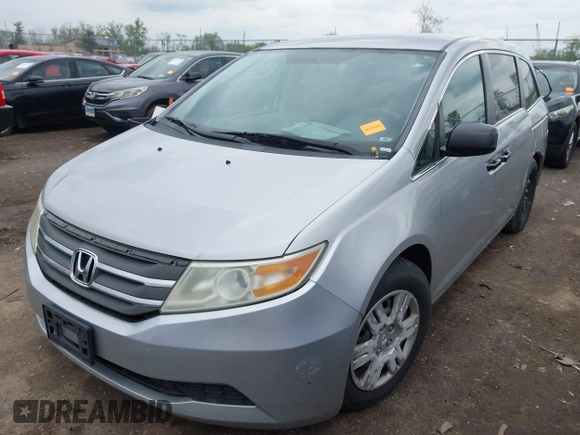 2012 Honda Odyssey LX with VIN 5FNRL5H22CB110569, listed as a IAAI auction lot 42151633 with 253,812 mi miles and . Bid and sale history available at carsss.com. Image 2.