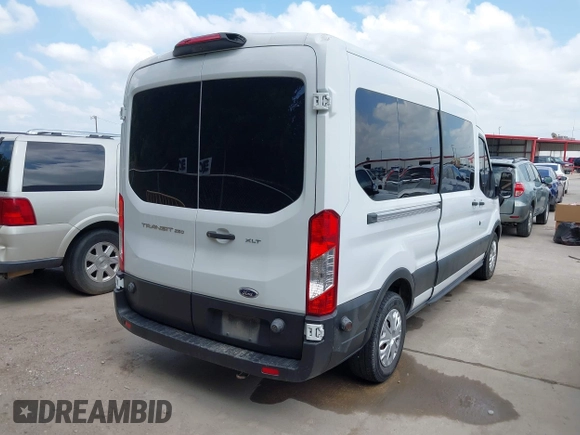 2019 Ford Transit with VIN 1FTYR2CM3KKB23365, listed as a IAAI auction lot 42439088 with 137,166 mi miles and . Bid and sale history available at DreamBid. Image 4.