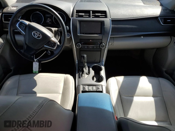 2015 Toyota Camry LE with VIN 4T1BD1FKXFU156118, listed as a Copart auction lot 52772745 with 129,600 mi miles and Salvage Title. Bid and sale history available at DreamBid. Image 8.