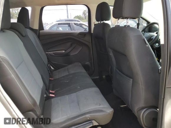 2017 Ford Escape S z VIN 1FMCU0F74HUA19804, wystawiony jako Copart lot #60260425 z przebiegiem 105 587 mil mil oraz Szkoda całkowita • Salvage title. Historia ofert i sprzedaży dostępna na DreamBid. Obrazek 11.