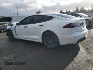 2024 Tesla Model S с VIN 5YJSA1E59RF541014, выставлен на аукционе Copart как лот 86646114 с пробегом 7 404 миль миль и Списание • Salvage title. История ставок и продаж доступна на DreamBid. Изображение 2.
