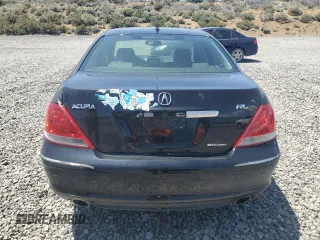 2005 Acura RL with VIN JH4KB16525C003353, listed as a Copart auction lot 61228265 with 150,548 mi miles and Salvage title. Bid and sale history available at DreamBid. Image 6.