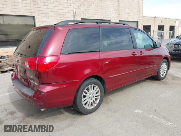 2009 Toyota Sienna XLE with VIN 5TDZK22C29S261516, listed as a IAAI auction lot 41831006 with 147,667 mi miles. Bid and sale history available at carsss.com. Image 4.