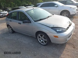 2002 Ford Focus ZX5 z VIN 3FAFP37392R110450, wystawiony jako IAAI lot #42393130 z przebiegiem 230 064 mil mil oraz . Historia ofert i sprzedaży dostępna na DreamBid. Obrazek 1.