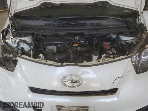 2013 Scion iQ with VIN JTNJJXB00DJ022387, listed as a Copart auction lot 61837745 with 151,944 mi miles and Salvage title. Bid and sale history available at DreamBid. Image 11.