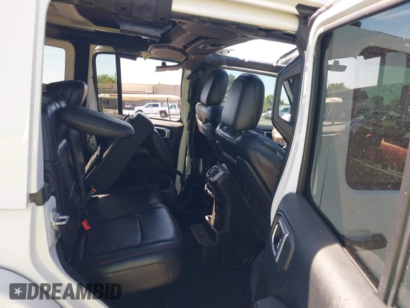 2018 Jeep Wrangler Unlimited Rubicon with VIN 1C4HJXFGXJW110629, listed as a IAAI auction lot 42141572 with 65,973 mi miles and . Bid and sale history available at DreamBid. Image 8.