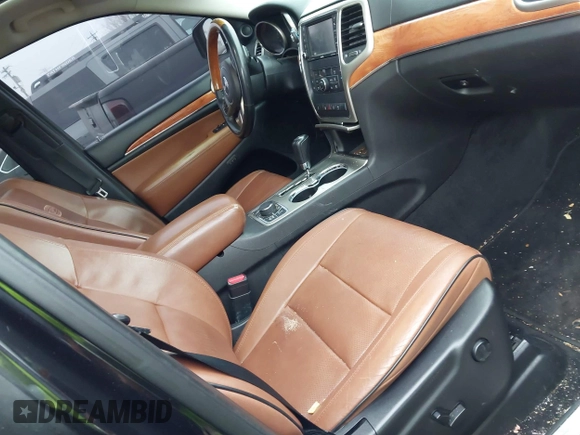 2013 Jeep Grand Cherokee Overland with VIN 1C4RJFCG1DC593890, listed as a IAAI auction lot 41264434 with 204,324 mi miles. Bid and sale history available at carsss.com. Image 5.